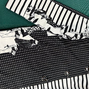 Oopéra Ladies' Reversible Rain Coat Black & White mixed media