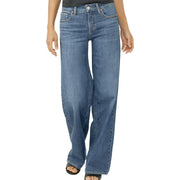 Blue jeans worn by a person on a white background