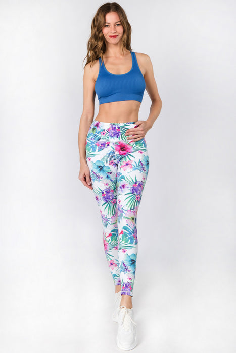 Palm leaf printed athletic leggings. Inseam approximately 28 in length. •  Flat reinforced high rise waistband • Hidden waistband pocket for keys,  phone, cash • Palm leaf print • Flat stitched seams