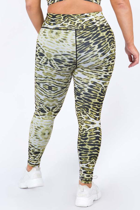 Women's Active Plus Size Pink Camouflage Workout Leggings. • High rise  waistband features hidden pocket for phone or other loose items • Pink  camouflage print • 4 way stretch for a move